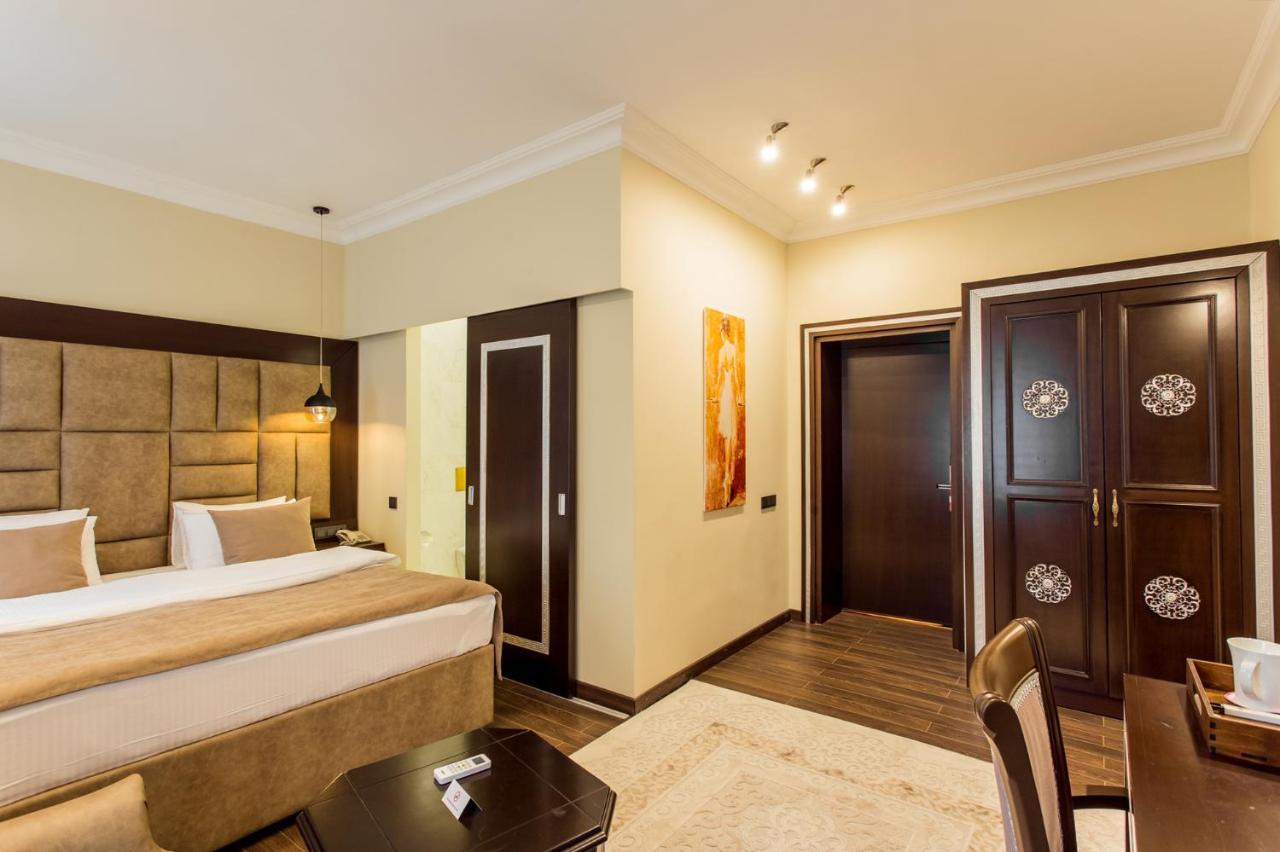 Ambassador Hotel อัลมาตี ภายนอก รูปภาพ