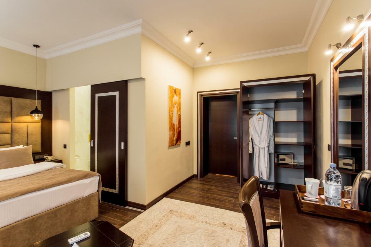 Ambassador Hotel อัลมาตี ภายนอก รูปภาพ